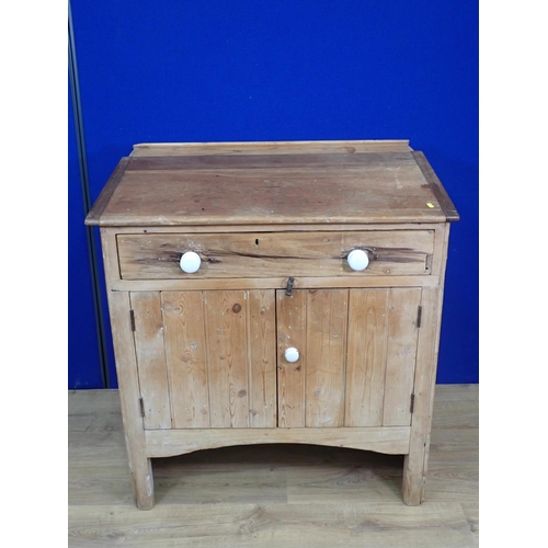 571 - An antique pine School Masters Desk fitted single drawer and two cupboard doors 3ft 5in H x 3f 2in W