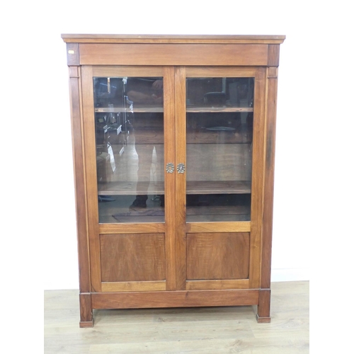 575 - A mahogany and glazed two door Bookcase fitted with adjustable shelves 4ft 11in H x 3ft 6in W