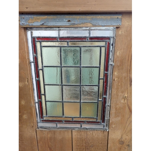 594 - An antique pine Cupboard with single door with leaded glass pane 5ft 3in H x 3ft 6in W