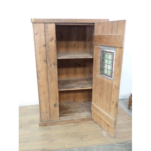 594 - An antique pine Cupboard with single door with leaded glass pane 5ft 3in H x 3ft 6in W