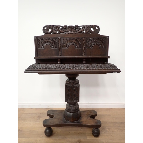 602 - An antique carved oak Console Table with arcaded back and carved cherub surmount 4ft 2in H x 3ft 1in... 