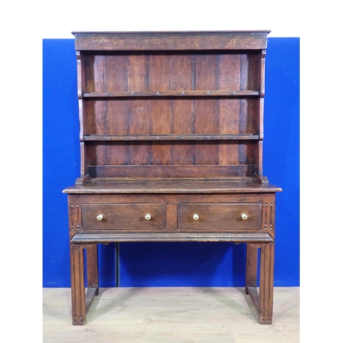 613 - An 18th Century style oak Dresser and Rack fitted two drawers to base on channel grooved front suppo... 