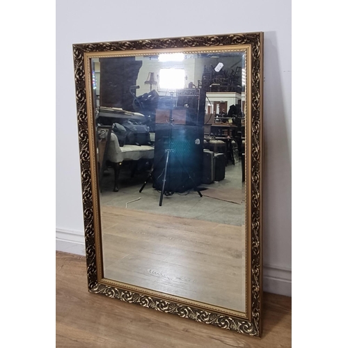 619 - A pine framed Mirror, two gilt framed Mirrors, a circular Mirror and a Print
THIS LOT IS BEING SOLD ... 