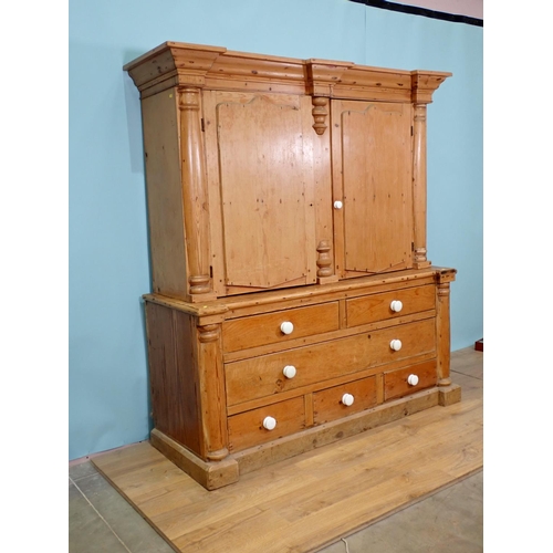 620 - A Victorian pine Housekeepers Cupboard fitted pair of fieded doors above base of five short and one ... 