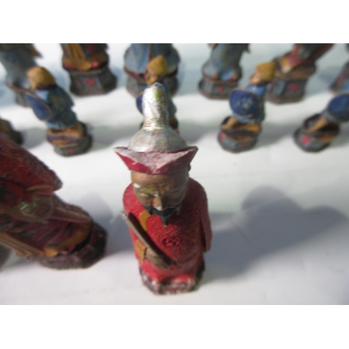 639A - A painted resin Chess Set, some chipped