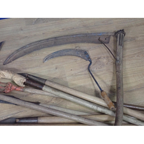 654 - A collection of Tools including Scythes, Rake and Hoe