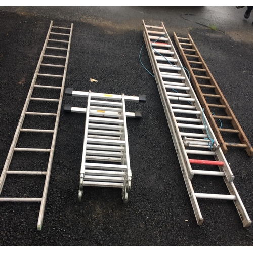 658 - Three metal Ladders and a wooden Ladder