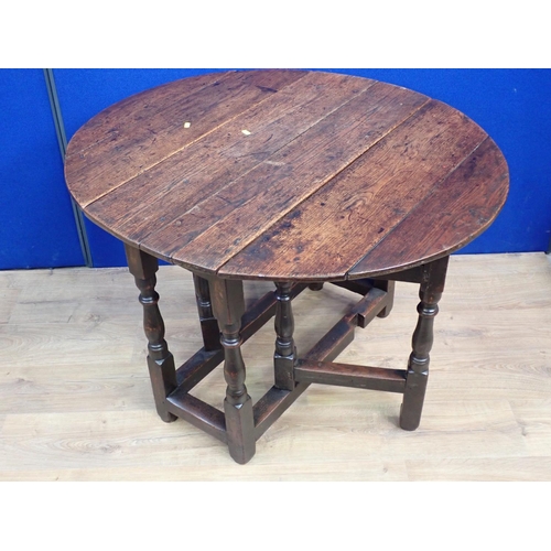 90 - An early 18th Century oak Gateleg Table mounted upon baluster turned supports 3ft W x 2ft 4in H