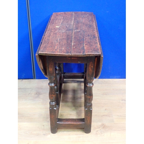 90 - An early 18th Century oak Gateleg Table mounted upon baluster turned supports 3ft W x 2ft 4in H