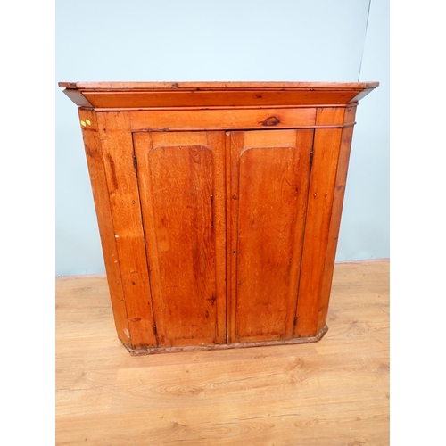 98 - A Victorian pine hanging Corner Cupboard fitted two doors 3ft 6in H x 3ft 4in W