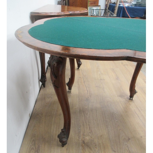 430 - A pair of Victorian walnut fold-over Card Tables of trefoil shape with green and red baize interior ... 