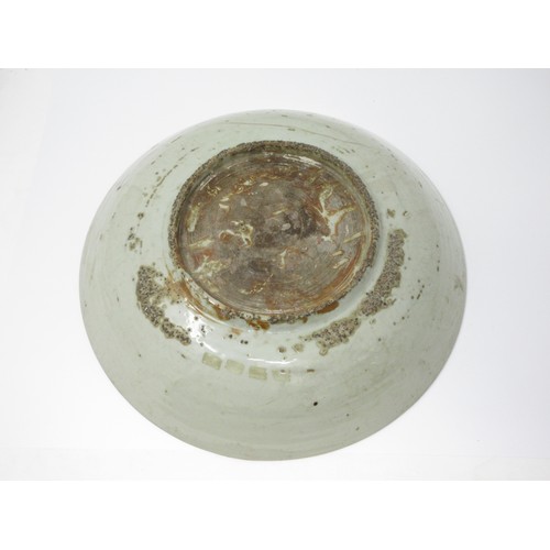 286 - An Oriental Celadon large Saucer Dish, 14 1/2 in, small repair and hair crack