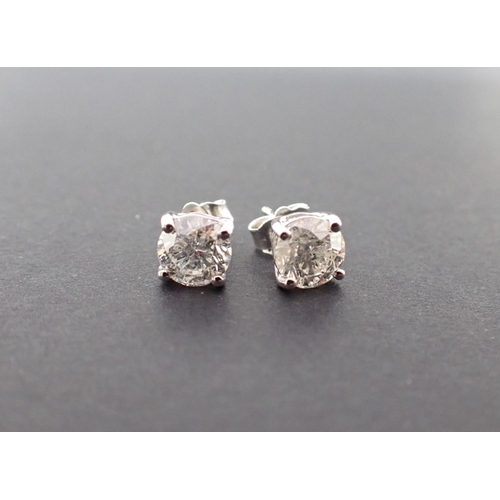 101 - A pair of Diamond Ear Studs each claw-set brilliant-cut stone, total diamond weight 2.06cts, in 18ct... 