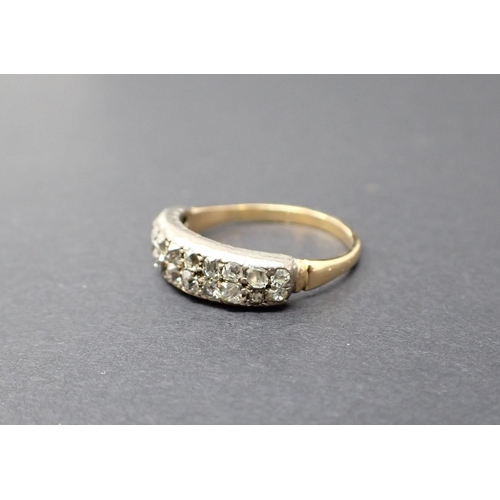 115 - A Diamond half Eternity Ring pavé-set two rows of old-cut stone, estimated 0.65cts, ring size N1/2-O