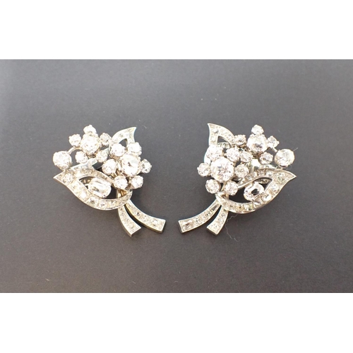 120 - A pair of Diamond Flower spray Earrings each claw-set clusters of old and cushion-cut stones between... 