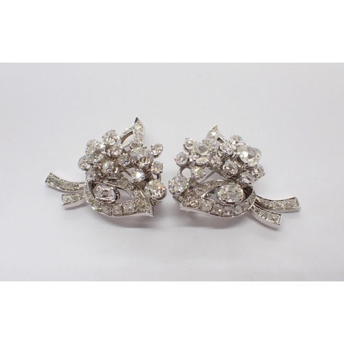 120 - A pair of Diamond Flower spray Earrings each claw-set clusters of old and cushion-cut stones between... 