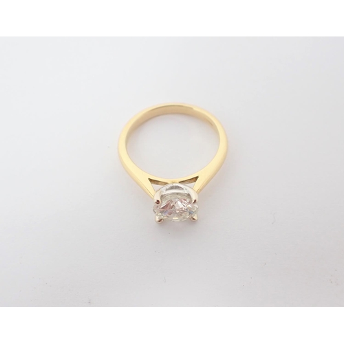 123 - A Diamond single stone Ring claw-set brilliant-cut stone, 1.54cts, in 18ct gold, ring size M.  Accom... 