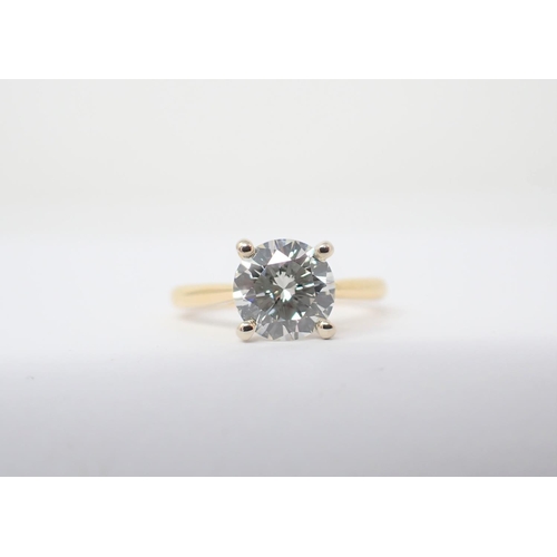 123 - A Diamond single stone Ring claw-set brilliant-cut stone, 1.54cts, in 18ct gold, ring size M.  Accom... 