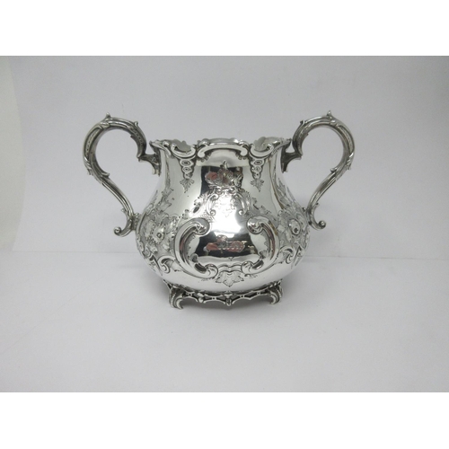 13 - A Victorian silver large two-handled Bowl with floral and scroll decoration, engraved crest, London ... 