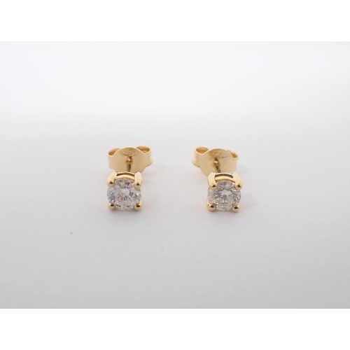 137 - A pair of Diamond Ear Studs each claw-set brilliant-cut stone, total diamond weight 0.64cts, in 18ct... 