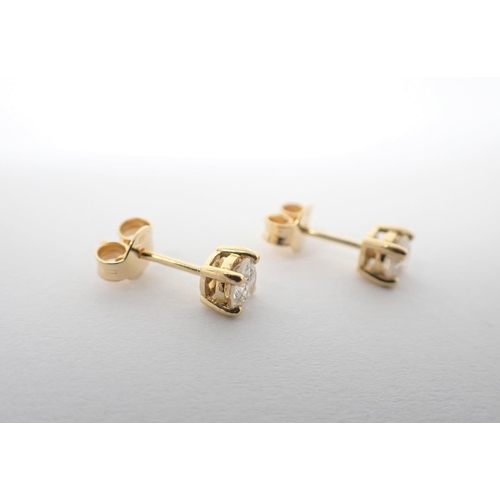 137 - A pair of Diamond Ear Studs each claw-set brilliant-cut stone, total diamond weight 0.64cts, in 18ct... 