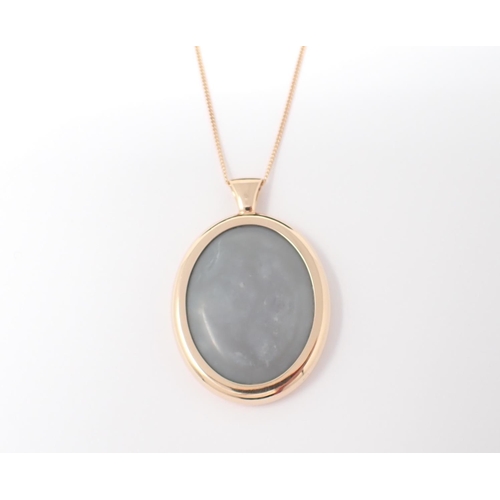 146 - An Opal Pendant set oval slice of opal, 31.80ct, in rose gold frame on fine chain in 18ct gold