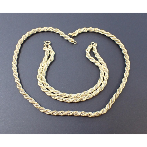 149 - An 18ct white and yellow gold rope twist Necklace and matching two strand Bracelet, approx 36gms