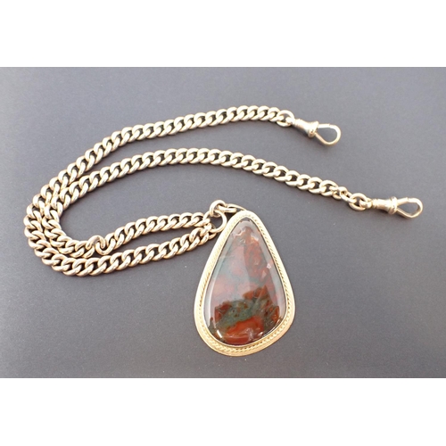 150 - A Moss Agate Pendant the drop shaped stone in 9ct gold surround suspended from a 9ct gold graduated ... 