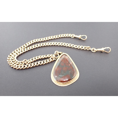 150 - A Moss Agate Pendant the drop shaped stone in 9ct gold surround suspended from a 9ct gold graduated ... 