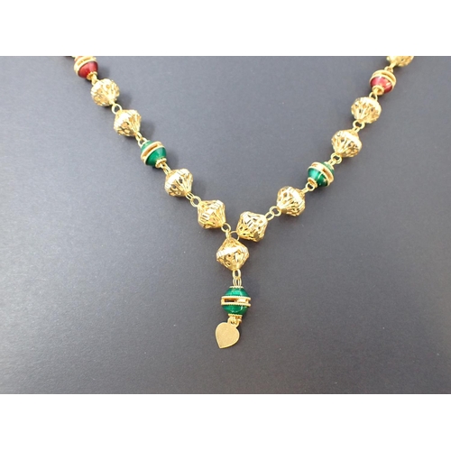 160 - A high grade gold fancy-link Necklace the front having pierced links interspersed with enamelled lin... 