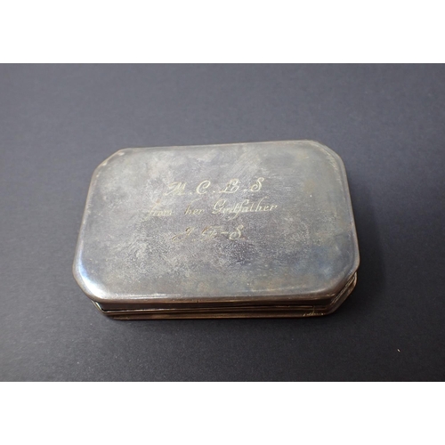 188 - An antique silver Snuff Box with hinged lid, scroll engraved decoration and presentation inscription... 