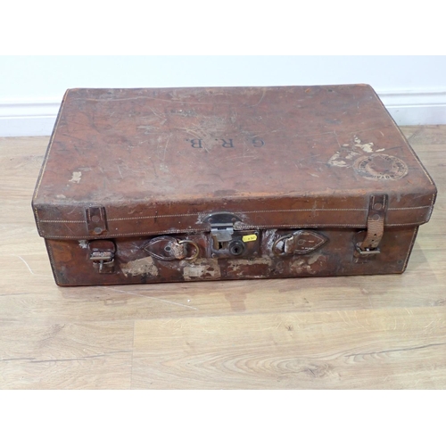 2 - A Gentleman's leather Travelling Case with silver topped glass bottles