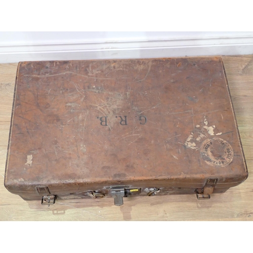 2 - A Gentleman's leather Travelling Case with silver topped glass bottles