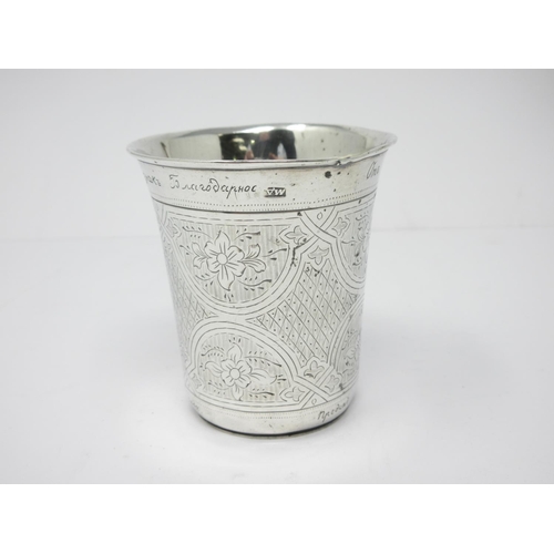 23 - A Russian silver Tumbler engraved floral and trellis panels, 3in, inscription to rim and base, marke... 