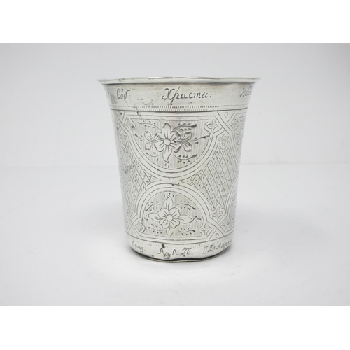 23 - A Russian silver Tumbler engraved floral and trellis panels, 3in, inscription to rim and base, marke... 