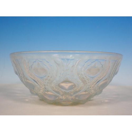 252 - An R Lalique circular Bowl with tear drop moulded design, marked R LALIQUE. FRANCE 8 in Diam