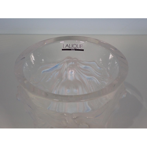 254 - A Lalique glass Vase with flared top, moulded naked female figures with flowing head dress, marked K... 