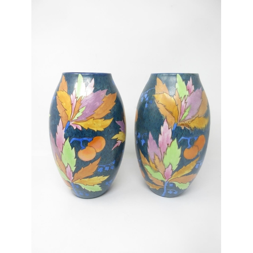 258 - A pair of Carlton Ware Handcraft ovoid Vases with leafage and fruit design, 10in, No 3272, and a sin... 