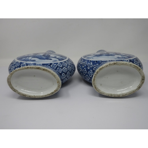 272 - A pair of Chinese blue and white Moon Flasks with designs of figures in landscapes, 10 1/2 in H, one... 