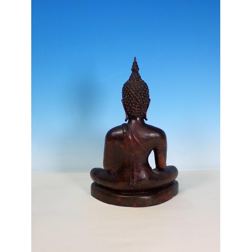 279 - An Eastern bronze Figure of a seated Buddha, 11 1/2in H