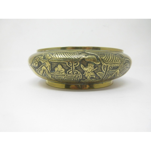 281 - A Chinese bronze Bowl with reserves of figures on horseback, etc, roundel of reign marks, etc, to un... 