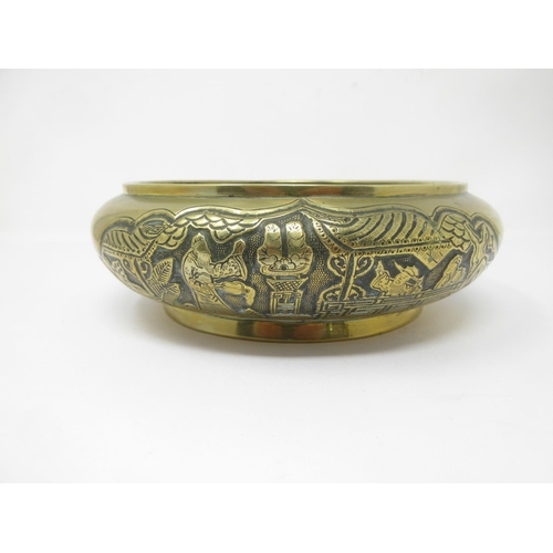 281 - A Chinese bronze Bowl with reserves of figures on horseback, etc, roundel of reign marks, etc, to un... 