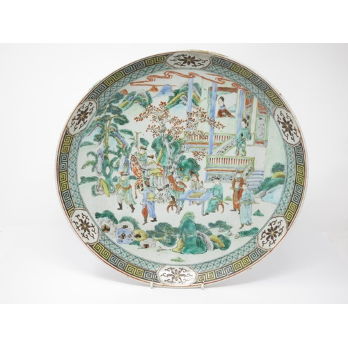 285 - A Chinese large Saucer Dish painted figures, etc, in famille verte enamels, 14in diam, small repair