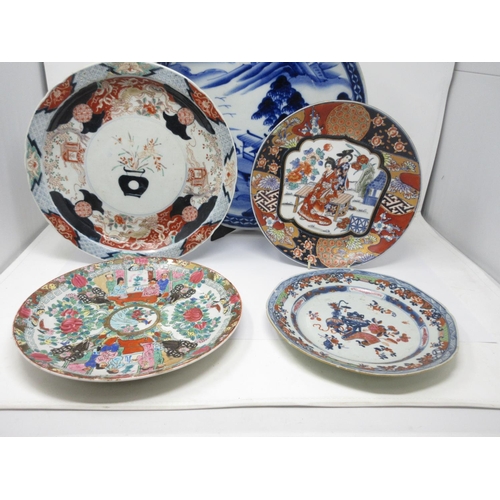 288 - A blue and white Charger painted mountainous landscape, 14 1/2 in, and six various Imari Plates, som... 