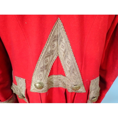 303 - A late 18th or early 19th Century British Army type 'Red Coat' with brass button initialled 'M', res... 