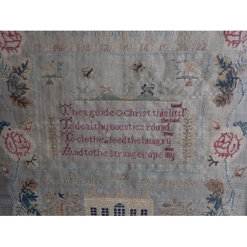 311 - A Georgian silk on tabby Sampler embroidered alphabet, birds, animals, verse and a house within flor... 