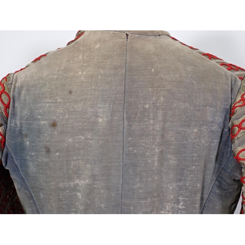 312 - An 18th Century gentleman's blue/grey velvet Frock Coat the front and sleeves embellished with red e... 