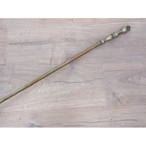 322 - An 18th Century brass Warming Pan with brass handle and pierced design to the cover, 3ft 9in L