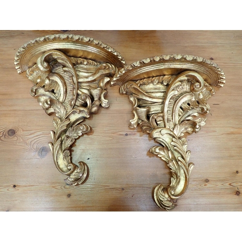 324 - A pair of gilt scroll Wall Brackets, a Plate Holder, a Picture Frame