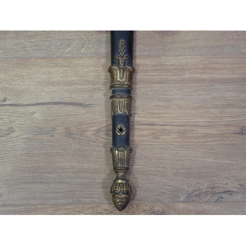 328 - A two branch Wall Light with flame finial, the scrolled arms with mythical head finials, 1ft 10in H